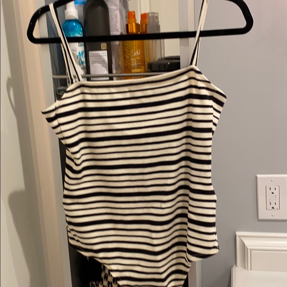 Black and white striped onesie with tie on back